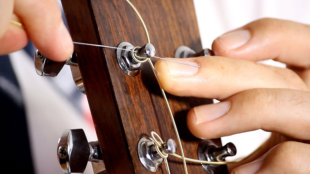 How to Change Strings on an Acoustic Guitar